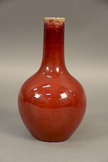 Chinese sang de beouf pear shaped vase, oxblood red with slender neck and bulbous body, wax seal and signature on bottom.  ht