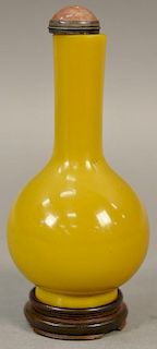 Chinese yellow glass bottle vase with elongated slender neck and bulbous body on stand.  ht. without stopper 5 1/4in.