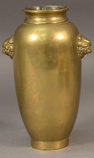 Chinese bronze vase with lion mask handles, signed on bottom. 
ht. 9in.