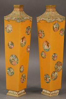 Pair of Satsuma vases having tall slender square form, yellow ground with round enameled flower panels, signed on bottom (one