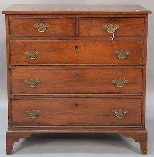 Federal walnut chest, two over three drawer set on cut out bracket feet, circa 1800. 
ht. 39in., wd. 37in., dp. 18 1/2in.