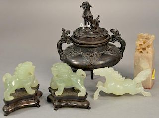 Five small Chinese pieces to include a pair of carved jadeite foo dogs (ht. 1 3/4in.), jadeite horse and a carved soapstone s