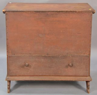 Primitive lift top blanket chest with one drawer set on carved bootjack ends in original red paint (original leather hinges d