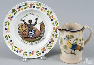 Leeds pearlware cream pitcher, early 19th c., with peafowl decoration, 3 5/8'' h., together with a pe