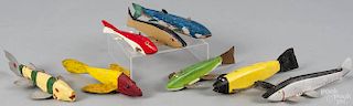 Eight carved and painted fish decoys, 20th c., longest - 8''.