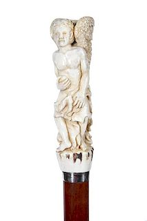 6. Stag Angel Cane- 20th Century- A carved angel handle which is completely carved, front and back, in high relief, signed st