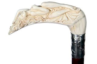 11. Boar Tusk Erotic Nude Cane- 20th Century- A high relief carved boar’s tooth in what we today call “pig ivory” fancy
