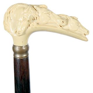 39. Celluloid Horse Cane- Ca. 1940- A three horse handle in pristine condition, a metal collar marked German silver, exotic h