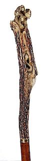 60. Japanese Stage Monkey Cane- Ca. 1890- A carved stag handle which has the hear-no-evil, see-no-evil, speak-no-evil monkeys