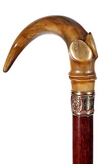 71. Victorian Horn Dress Cane- Ca. 1870- A carved crook handle horn cane with a pair of raised finger rest, ornate gold-fille