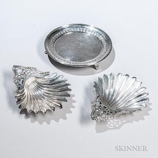 Three Pieces of George III Sterling Silver Tableware, London, late 18th century, two shell-form dishes, marks rubbed, possibl