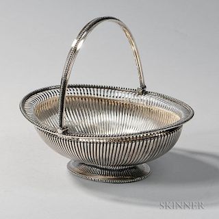 George III Sterling Silver Basket, London, 1780-81, maker's marks indistinct, oval with a gadrooned body and beaded rim and b