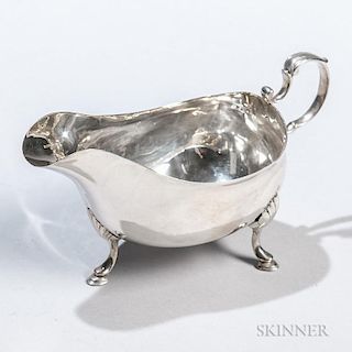 Irish Victorian Sterling Silver Sauceboat, Dublin, 1839-40, lacking maker's mark, of typical form with scrolled handle, on th