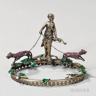 Viennese Silver-gilt and Enamel Ornament, Austria, 19th century, unmarked, the oval base topped by Diana holding a bow and ch