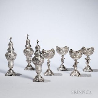 Seven Pieces of German .800 Silver Tableware, probably Hanau, early 20th century, with three casters and four reticulated sal
