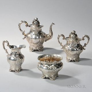 Four-piece American Coin Silver Tea Service, mid-19th century, marked "W&H," possibly for Wood & Hughes, monogrammed, each wi