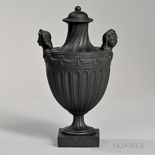 Wedgwood & Bentley Black Basalt Vase and Cover, England, c. 1775, shape no. 41 with maiden head handles, swirled fluting to t