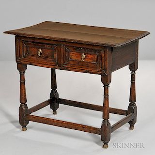 English Oak Two-drawer Tavern Table, 18th century, rectangular top over two-drawer frieze, lower stretcher joining turned col
