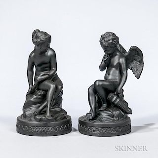 Pair of Wedgwood Black Basalt Cupid and Psyche Figures, England, 19th century, each modeled seated atop a rocky base set on a
