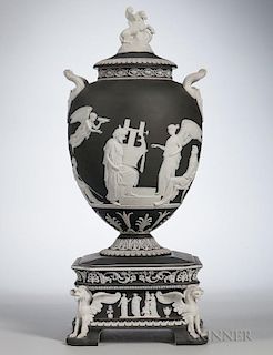 Wedgwood Black Jasper Dip Apotheosis of Homer Vase and Cover, England, 19th century, applied white relief, the cover with Peg