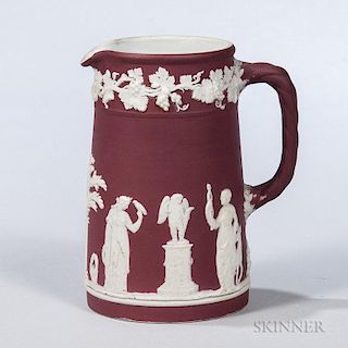 Wedgwood Crimson Jasper Dip Tall Jug, England, c. 1920, applied white classical figures in relief, impressed mark, ht. 4 7/8 