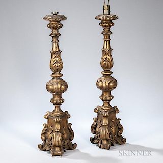 Pair of Giltwood Candlesticks, electrified, with foliate carved stem and base, ht. 28 in.