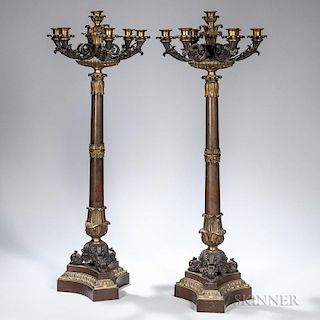 Pair of Seven-light Bronze Candelabra, 20th century, electrified, with acanthus-capped sconces on a columnar stem terminating