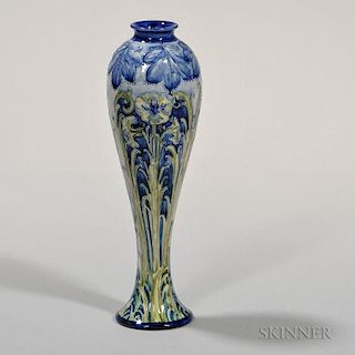 Macintyre Florian Ware Poppies Vase, England, c. 1900, shades of blues, green, and yellow to a slender shape, signed and prin