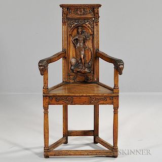 French Gothic Revival Carved Walnut Caqueteuse, 19th/early 20th century, back depicts the figure of a woman holding a shield 