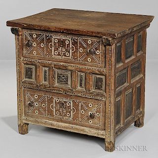 Spanish Colonial-style Carved Oak Chest, 19th century, top projection over paneled case with two drawers decorated with chip-
