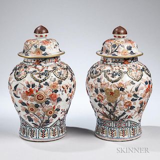 Pair of Samson-type Imari-style Urns, France, early 20th century, each with white ground with polychrome decoration, conical 