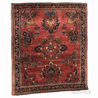Sarouk Mat, Iran, c. 1920, featuring a design of  spacious floral sprays on a deep red field, 2 ft. 5 in. x 2 ft. 1 in.