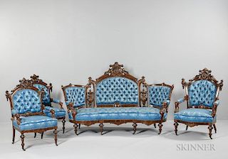American Upholstered Carved Walnut Seating Suite, attributed to John Jeliff, c. 1879, with burl walnut veneer, each with cent