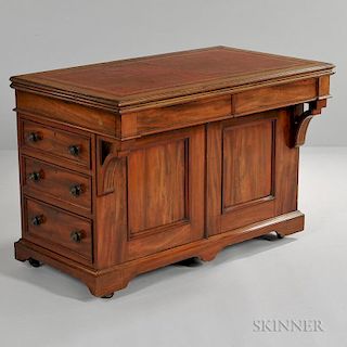 Victorian English Architect's Desk, England, 19th century, tooled red leather top unfolds and swivels to baize-inset surface,