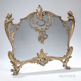 Louis XV-style Bronze Fire Screen, late 19th/early 20th century, centralized foliate crest with boss extending to winged putt