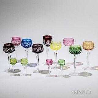 Twenty-nine Pieces of Colored Glass Stemware, probably Bohemia, early 20th century, each cut-to-clear in varying colors, incl