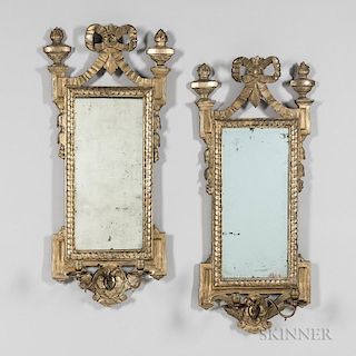 Pair of Italian Giltwood Mirrored Two-light Candle Sconces, 19th century, ribbon crest flanked by urns over rectangular glazi