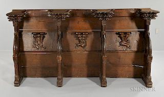 French Carved Oak Triple Choir Stall, 18th century with later elements, molded cornice over three conjoined stalls with fold-