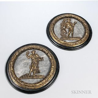Pair of Grand Tour Bronze-mounted Marble Plaques, 19th century, each round with a figural scene, one of a man with an ewer, t