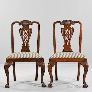 Pair of Georgian-style Carved Side Chairs, England, 19th century, crest rail with centralized fan over a pierced splat, suppo