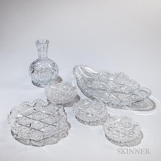 Seven Pieces of Brilliant-cut Glass, probably America, early 20th century, each colorless, with various motifs, a round tray,