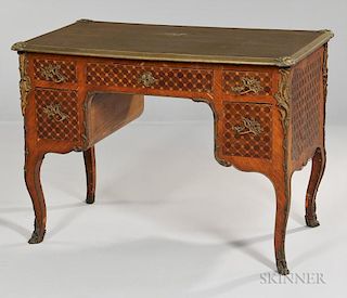 Louis XV-style Parquetry Writing Table, 19th century, with a leather-inset top above inlaid drawers on bronze mounted cabriol