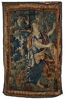 Flemish Tapestry Fragment, 18th century, depicting a goddess in a lush foliage scene, with foliate border, ht. 104, wd. 66 in