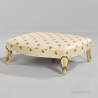Louis XVI-style Ottoman, 20th century, shield-shaped silk-covered top over painted and gilded cabriole legs, label to undersi