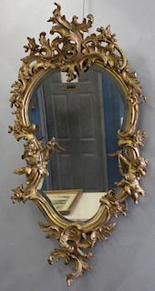 Antique Carved and Giltwood Mirror In The