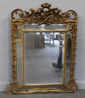 19 Century Carved Giltwood and Gessoe Mirror.