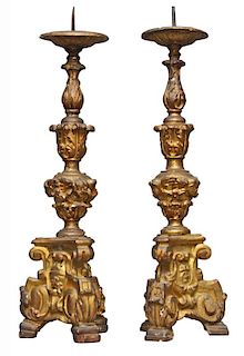 A Pair of Venetian Baroque Carved and Gilded Pricket Sticks, 18th century