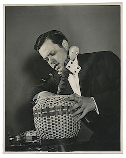 Two Photographs of Orson Welles with Magic Props.