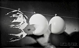 Harold E. "Doc" Edgerton (American, 1903-1990)      Bullet Passing Through Three Balloons