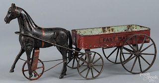 Ives cast iron walking horse with a painted Fast Mail wagon, 15 1/2'' l.
